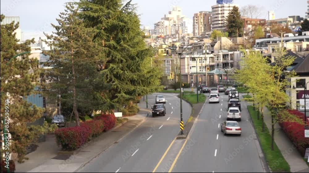 Vibrant Aerial View of Cityscape and Busy Road with Moving Cars Vibrant Aerial View of Cityscape and Busy Road with Moving Cars