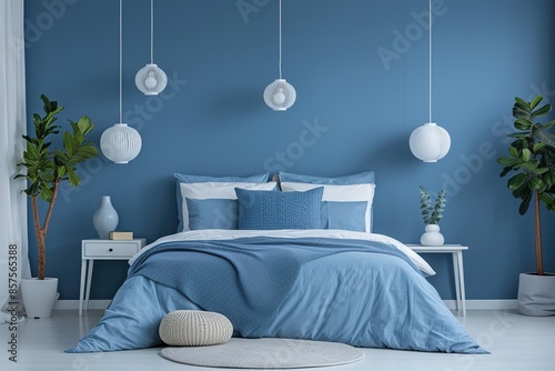 Stylish bedroom interior in trendy blue