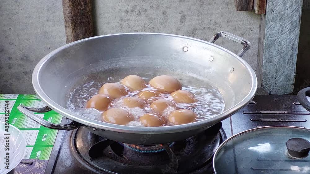 Brown eggs cooking in bubbling water