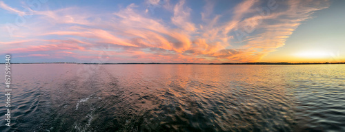 Colorful Cloudscape Sunset over Lake Mendota on the Boat photo