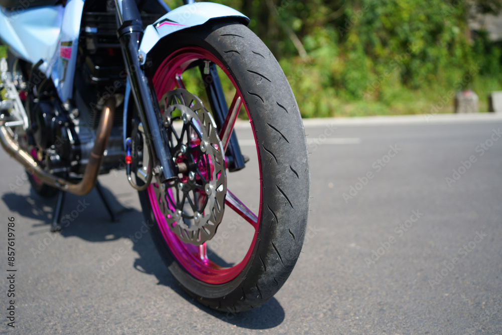 close up of a 4-Stroke underbone category sports motorbike outer tire close up of a 4-Stroke underbone category sports motorbike outer tire