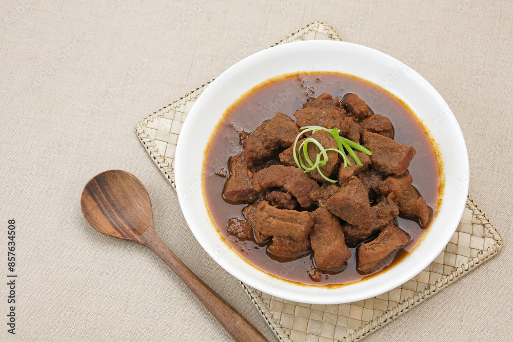 Daging Kelem, made from beef, coconut milk and spices. Indonesian food
Daging Kelem, made from beef, coconut milk and spices. Indonesian food