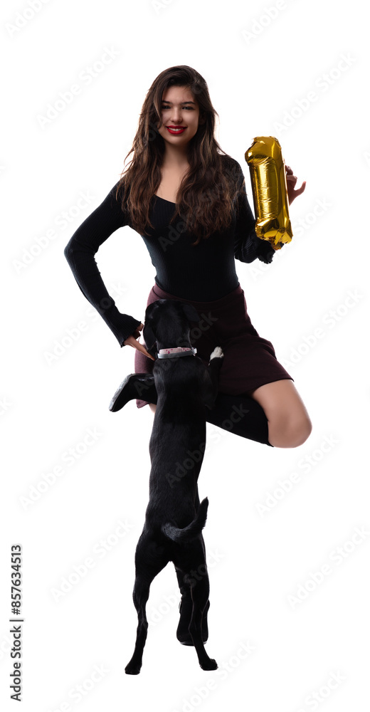 Celebration time with young woman and playful dog Celebration time with young woman and playful dog