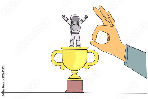 Single continuous line drawing the young astronaut standing on big trophy. Celebrating the success of business. Got fraudulent business opponents. Falling helpless. One line design vector illustration
