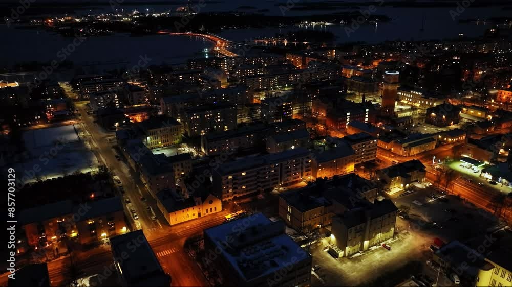 Aerial overview of the night lit Vaasa city skyline, winter evening in Finland Aerial overview of the night lit Vaasa city skyline, winter evening in Finland