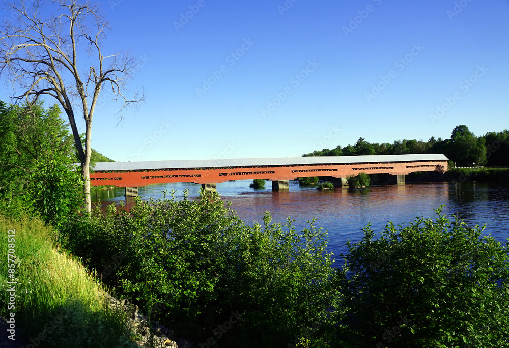 Red covered bridge across the Coulonge River in western Quebec Red covered bridge across the Coulonge River in western Quebec