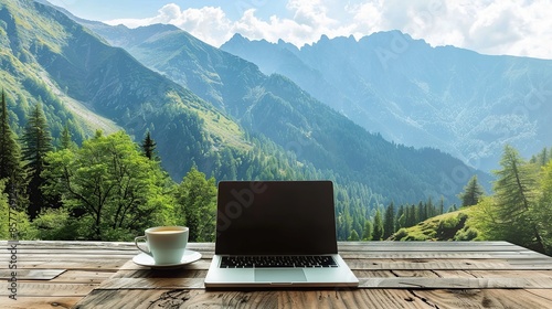 Workspace with laptop and coffee on wooden table with nature mountain background, Freelance worker. copy space for text.