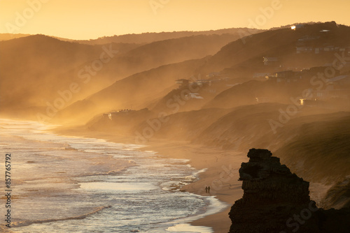 Hazy Golden Sunset people on beach - Aireys Inlet, Great Ocean Road photo