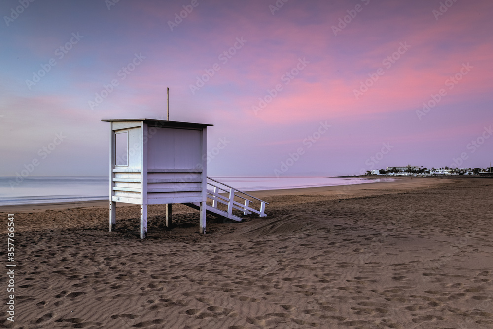Lifeguard tower on the empty beach at sunrise in Puerto del Car Lifeguard tower on the empty beach at sunrise in Puerto del Car