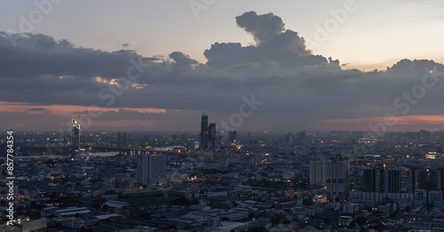 Photography Aerial view of skyscrapers and dramatic sky before sunset