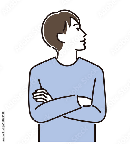 腕を組む男性