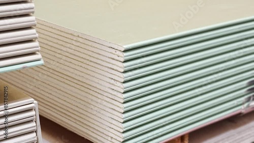  water repellent gypsum board on a rack in a hardware store. sale of building materials for repair and construction.