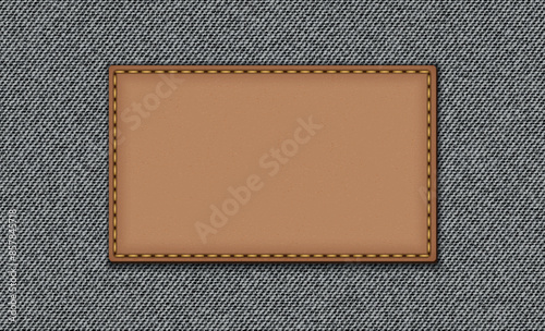 Black jeans texture. Denim background. Leather badge, denim label.
