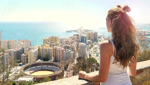Woman tourist enjoying panoramic view of Malaga- Spain