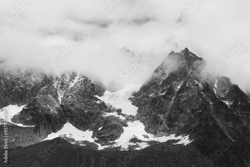 Black and white photo of snow-covered mountains in the French Alps.