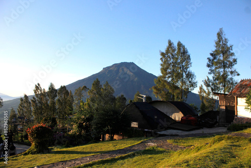Natural views of tropical mountains, bright blue skies, Mount Sindoro in Temanggung, Indonesia photo