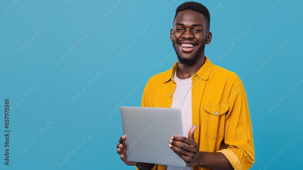 The man holding laptop. The man holding laptop.