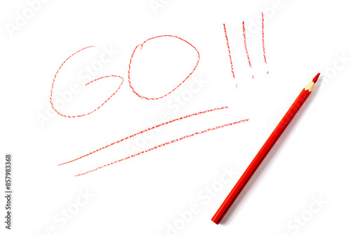 The word GO written in red pencil on a white sheet of paper photo