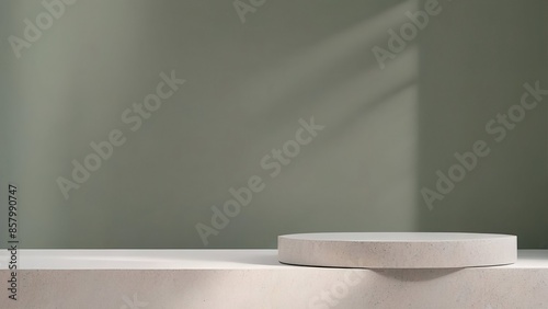 Obraz na płótnie Round light marble podium for product presentation against a gray green wall with a beautiful shadow. w salonie