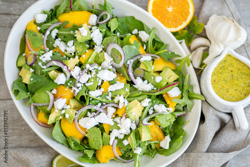 Photography Fresh mango salad with tropical, zesty fruit dressing