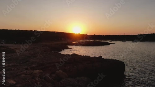 Sunset in Cala Bassa Ibiza with Drone photo