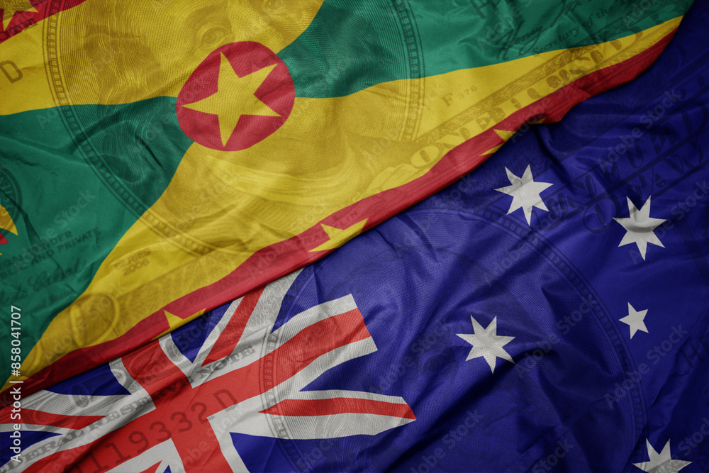 waving colorful flag of grenada and national flag of australia on the dollar money background. finance concept.