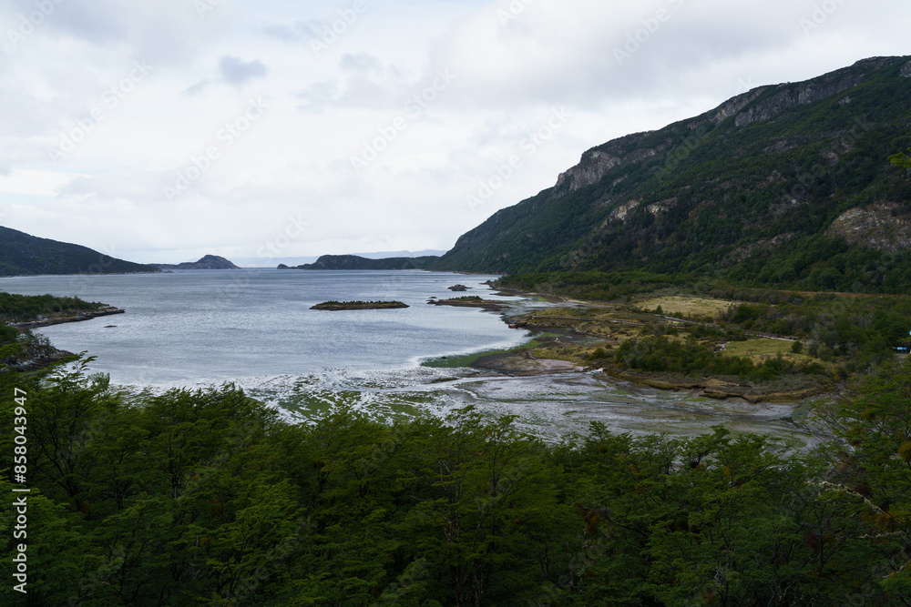 Landscape of the Beagle Channel with surrounding Andean mountains from Tierra del Fuego National Park, Ushuaia - Argentina. Landscape of the Beagle Channel with surrounding Andean mountains from Tierra del Fuego National Park, Ushuaia - Argentina.
