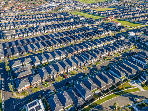 Aerial drone view of The Ponds in the North West of Sydney, NSW Australia on a sunny morning in June 2024 showing the densely packed homes and housing density 