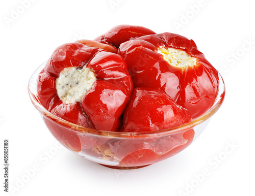 Glass bowl with hot red tiny cherry peppers stuffed with soft ricotta cheese  isolated on white background. With clipping path.