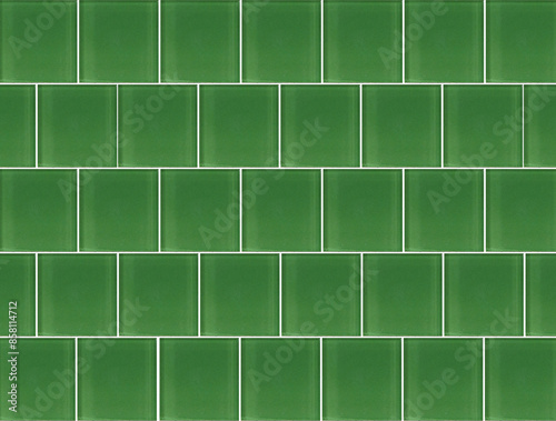 Green ceramic tile background. Old vintage ceramic tiles in green to decorate the kitchen or bathroom 