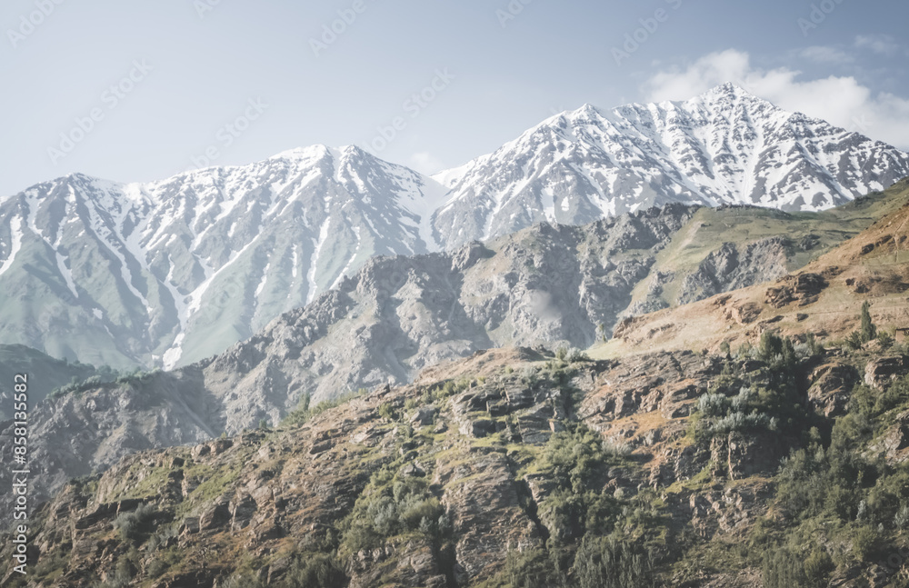 Texture of mountain range with rocks and glaciers in Tien Shan mountains in Tajikistan in Pamir early in the morning Texture of mountain range with rocks and glaciers in Tien Shan mountains in Tajikistan in Pamir early in the morning