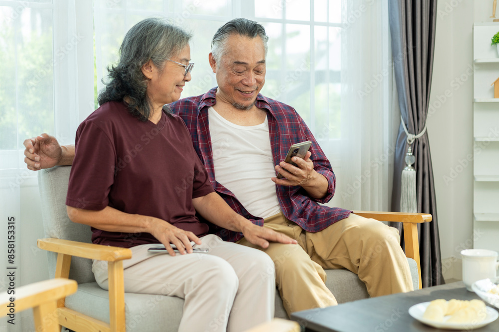Senior couple use smartphone in social network and selfie with happy together Senior couple use smartphone in social network and selfie with happy together
