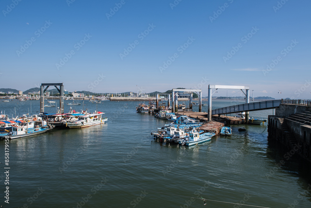 Fototapeta premium Scenery of a fishing village with small fishing boats 