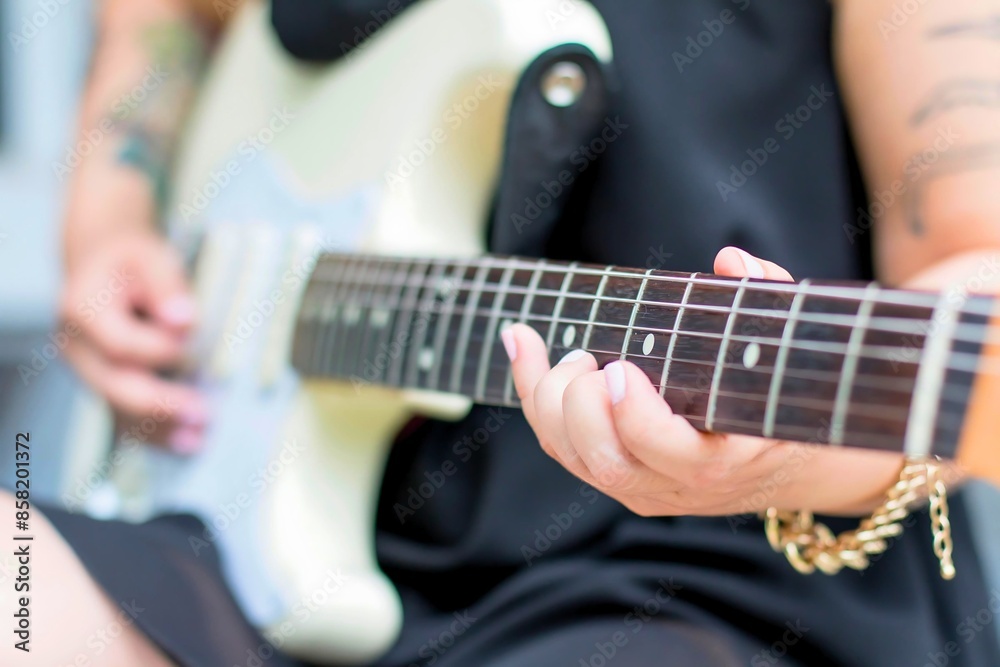 Fototapeta premium Guitar player hands close up