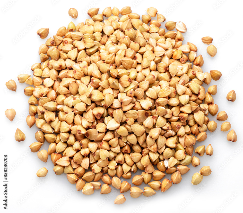 Hulled kernels of buckwheat cereal isolated on white background. Hulled kernels of buckwheat cereal isolated on white background.