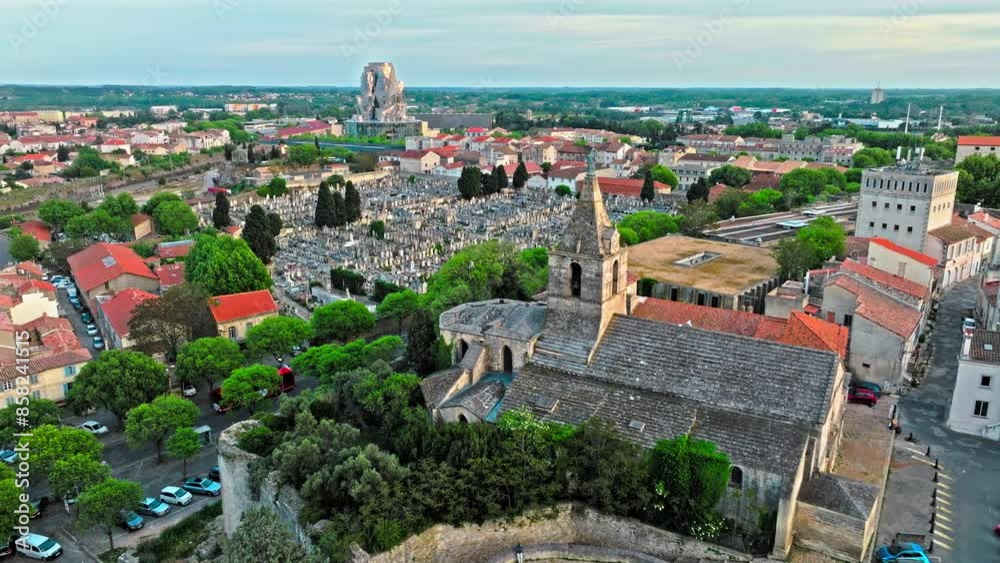 Aerial view of Ancient, 2-tiered Roman gladiatorial amphitheatre hosting bullfighting and community events. Panorama of ancient town Arles in Provence and Cote d'Azur, France, South Europe. Aerial view of Ancient, 2-tiered Roman gladiatorial amphitheatre hosting bullfighting and community events. Panorama of ancient town Arles in Provence and Cote d'Azur, France, South Europe.