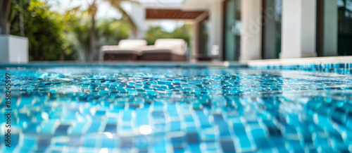 Stunning Miami Pool Replastering with Blue and White Mosaic Tiles