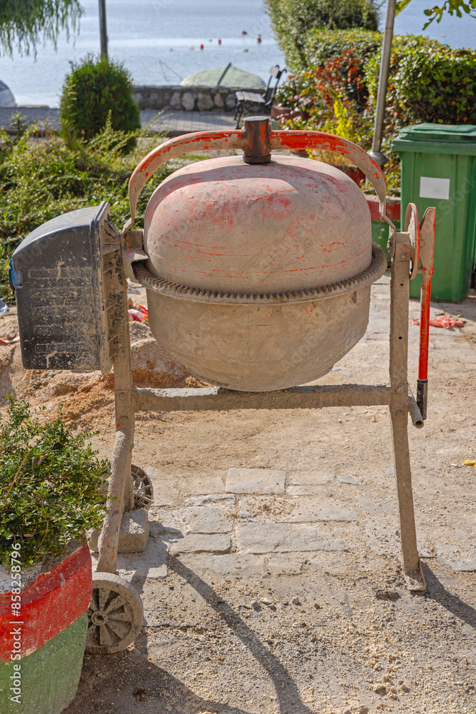 Electric Concrete Cement Mixer at Construction Site Electric Concrete Cement Mixer at Construction Site