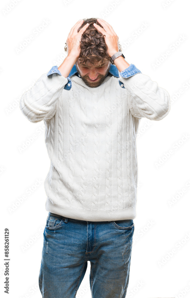 Fototapeta premium Handsome hispanic man model wearing winter sweater over isolated background suffering from headache desperate and stressed because pain and migraine. Hands on head.