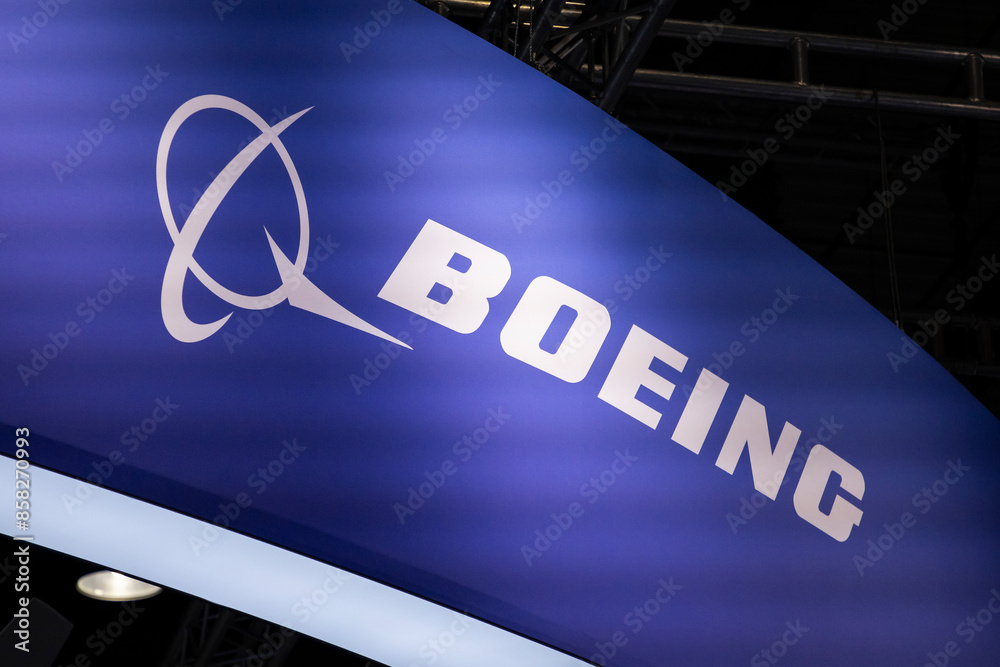 Boeing Company logo sign at blue background on an aviation industry ...