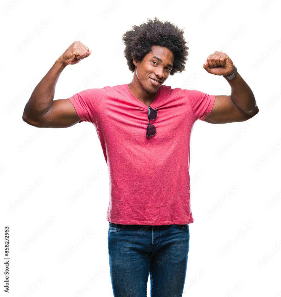 Afro american man over isolated background showing arms muscles smiling proud. Fitness concept. Afro american man over isolated background showing arms muscles smiling proud. Fitness concept.