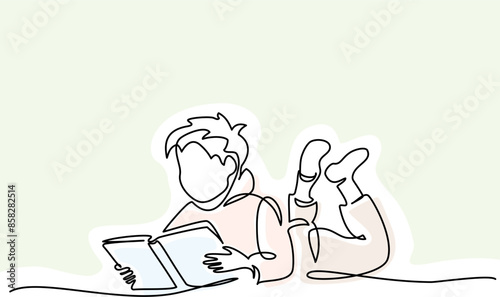 Happy Boy reading open book laying on floor. Continuous one line