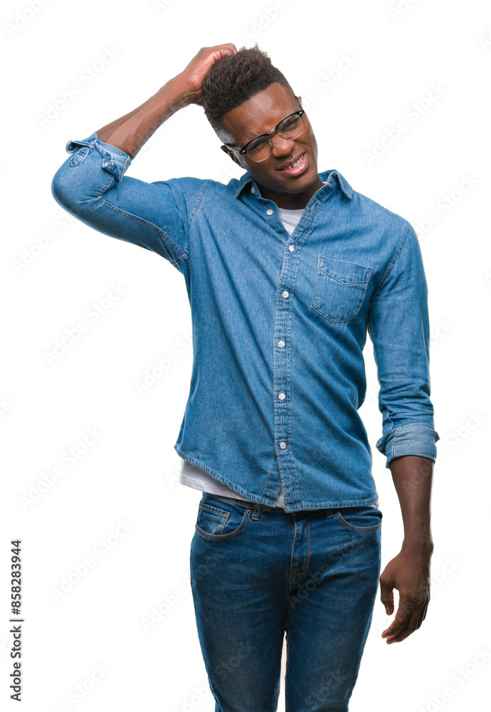 Young african american man over isolated background confuse and wonder about question. Uncertain with doubt, thinking with hand on head. Pensive concept. Young african american man over isolated background confuse and wonder about question. Uncertain with doubt, thinking with hand on head. Pensive concept.