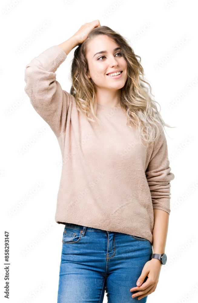 Fototapeta premium Beautiful young blonde woman wearing sweatershirt over isolated background Smiling confident touching hair with hand up gesture, posing attractive