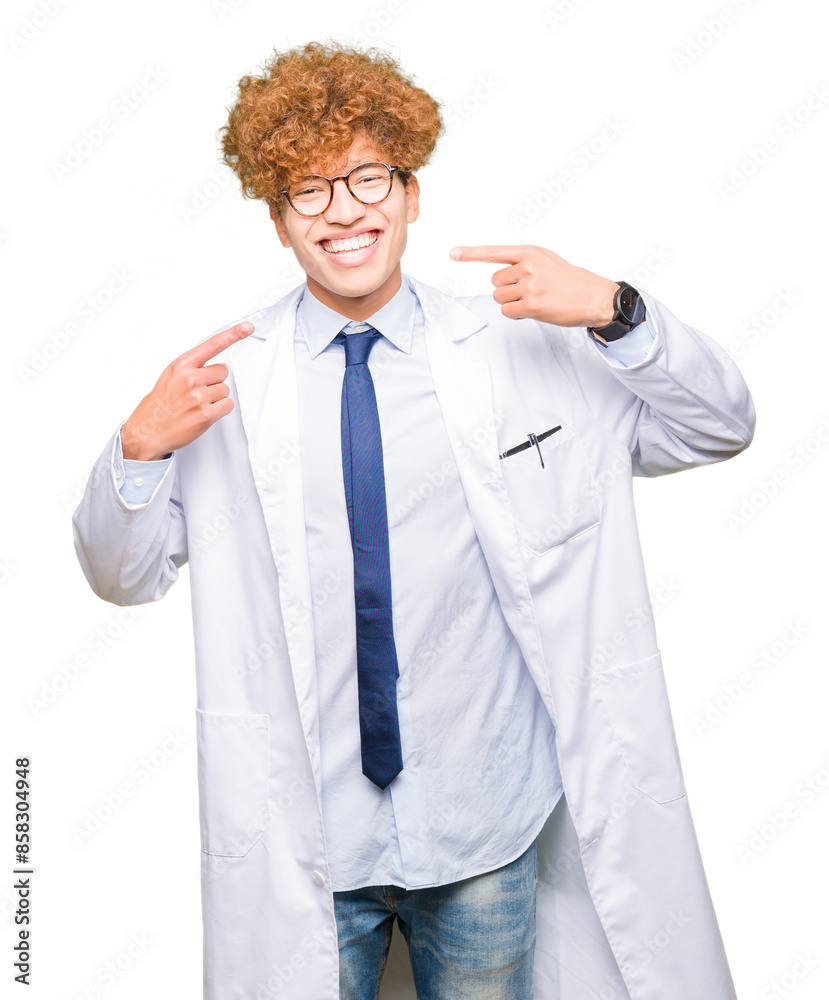 Young handsome scientist man wearing glasses smiling confident showing and pointing with fingers teeth and mouth. Health concept. Young handsome scientist man wearing glasses smiling confident showing and pointing with fingers teeth and mouth. Health concept.