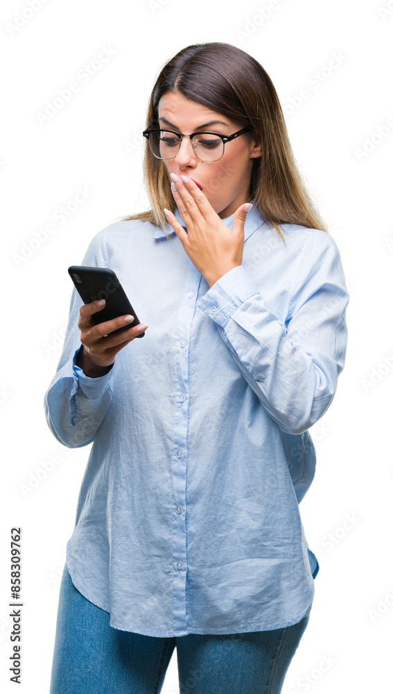 Young beautiful business woman texting message using smartphone over isolated background cover mouth with hand shocked with shame for mistake, expression of fear, scared in silence, secret concept Young beautiful business woman texting message using smartphone over isolated background cover mouth with hand shocked with shame for mistake, expression of fear, scared in silence, secret concept
