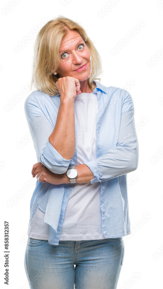 Middle age blonde woman over isolated background with hand on chin thinking about question, pensive expression. Smiling with thoughtful face. Doubt concept. Middle age blonde woman over isolated background with hand on chin thinking about question, pensive expression. Smiling with thoughtful face. Doubt concept.