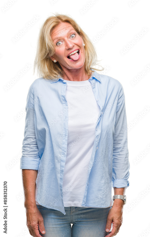 Middle age blonde woman over isolated background sticking tongue out happy with funny expression. Emotion concept. Middle age blonde woman over isolated background sticking tongue out happy with funny expression. Emotion concept.