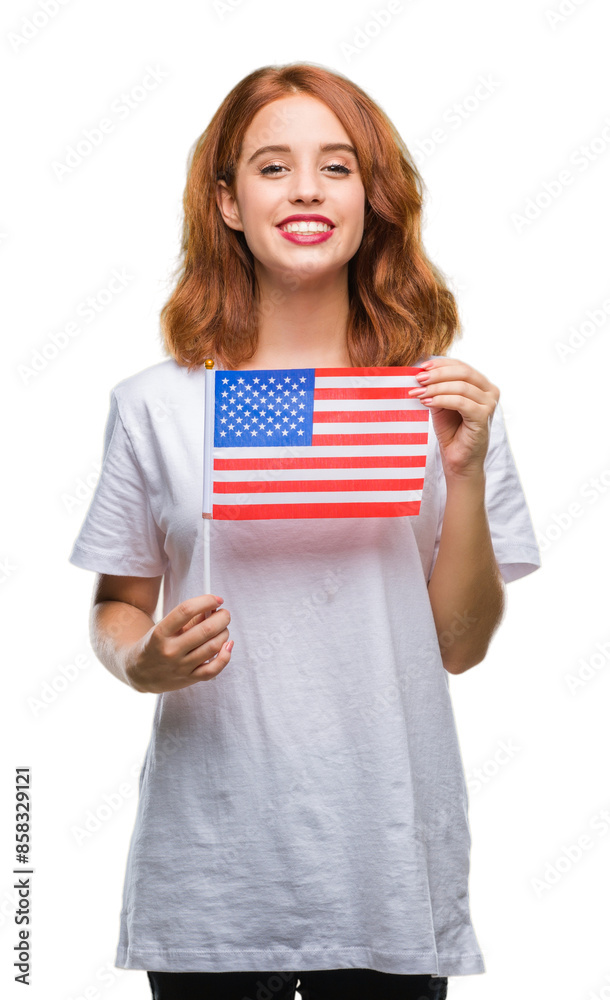 Young beautiful woman holding flag of america over isolated background with a happy face standing and smiling with a confident smile showing teeth Young beautiful woman holding flag of america over isolated background with a happy face standing and smiling with a confident smile showing teeth