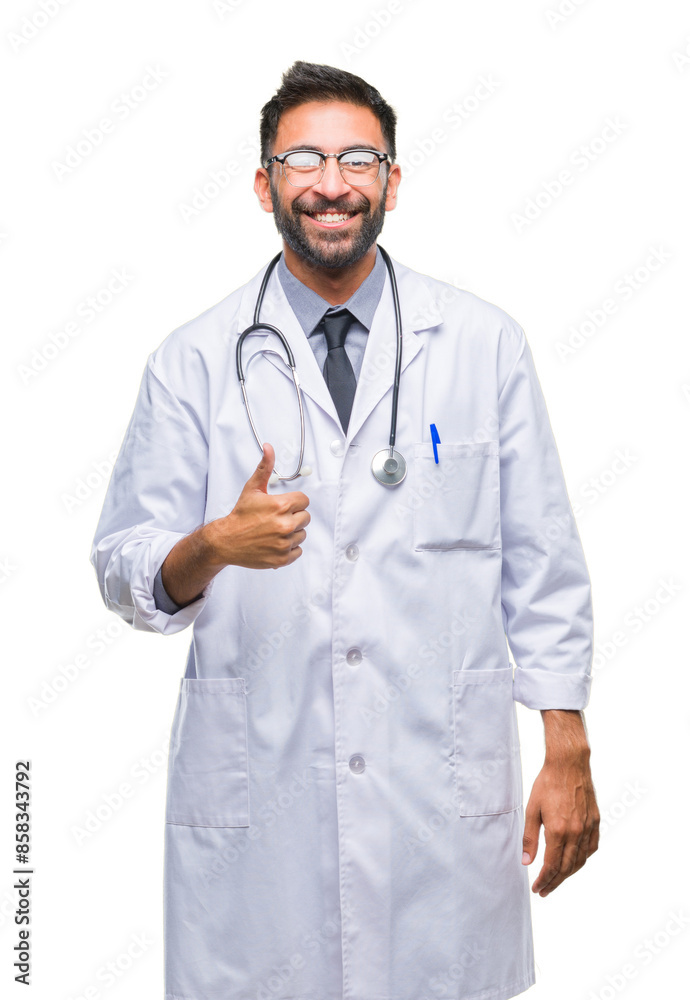 Adult hispanic doctor man over isolated background doing happy thumbs up gesture with hand. Approving expression looking at the camera with showing success.
